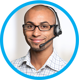 A male customer service representative wearing a headset with microphone.