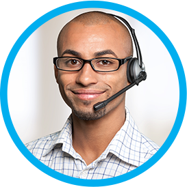 A male customer service representative wearing a headset with microphone.